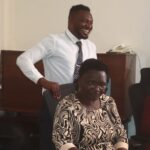Peter Siku Karisa (Pday Hurrikane) Standing with white shirt at MCSK boardrooom as one of the directors