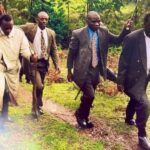 The Late George Odour (Behind ODM Leader Raila Odinga).